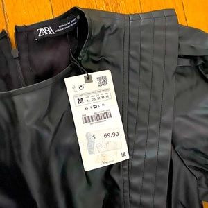 Black leather dress.